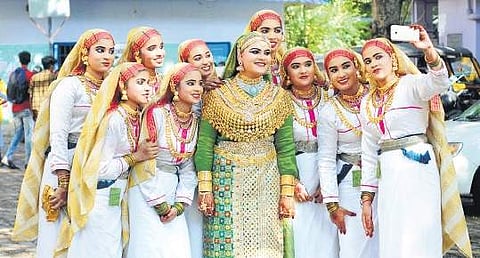 The students of  Vidhyadhiraja Vidhyabhavan HSS Aluva, who survived the floods, pose for a selfie at  Govt Girls HSS Ernakulam as part of the Revenue District School Kalolsavam on Wednesday    A Sanesh