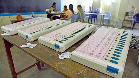 Electronic Voting Machines inside a polling station used for representative purposes only.