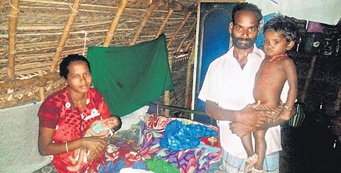 Manjula and husband T Ramesh with their children in their house at Therkalathur village in Nagapattinam | Express