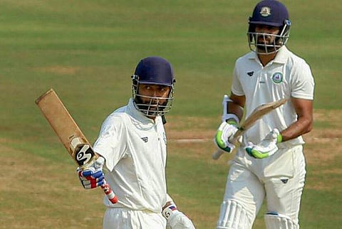 Vidarbha batsman Wasim Jaffar celebrates after scoring 153 runs against Baroda during Ranji Trophy cricket match in Nagpur Wednesday Nov. 21 2018. | PTI