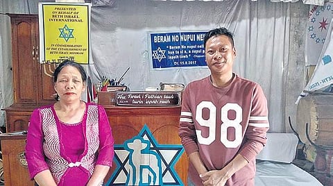 Lalthlamuani Sailo with her son Franky at their home in Aizawl, Mizoram. The home is also one of three synagogues among the community | Express photo