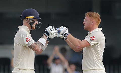 England's Jonny Bairstow (R) celebrates scoring a century with his teammate Ben Stokes during the first day of the third Test match against Sri Lanka in Colombo | AP