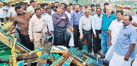 The team looks at a shattered boat at Mallipattinam on Sunday. | Express Photo Services
