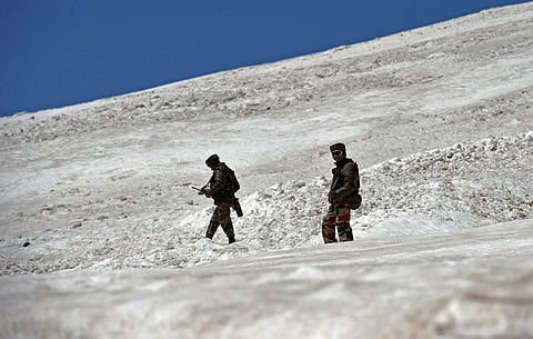 Army soldiers patrol in the snow bound way to frontier region of Ladakh .(Photo: File / PTI)