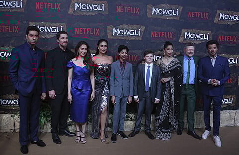 (Left to right) Abhishek Bachchan, Christian Bale, Madhuri Dixit, Kareena Kapoor, Rohan Chand, Louis Serkis, Freida Pinto, Andrew Serkis and Anil Kapoor pose at a red carpet of Netflix's Mowgli world premier in Mumbai, Nov 25, 2018. (Photo | AP)