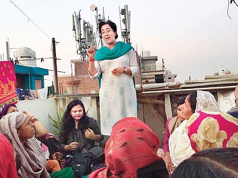 AAP leader Atishi Marlena speaks with women in Okhla and JJ colony in New Delhi on Sunday | PIC COURTESY: AAP TWITTER HANDLE