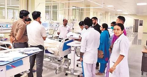 A team headed by Neurosurgery head Dr Anil Kumar Peethambaran examining a patient who was shifted to the polytrauma wing at the new block