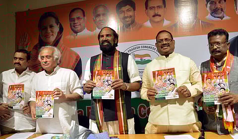 Hyderabad Congress leaders Jairam Ramesh RC Khuntia Uttam Kumar Reddy and others release party's election manifesto in Hyderabad Tuesday Nov. 27 2018. (Photo | PTI)