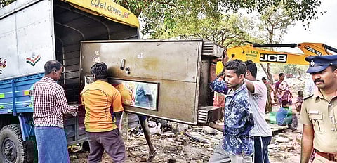 Residents of Navalar Nedunchezhian Nagar at Chintadripet being evicted in Chennai on Wednesday | P Jawahar