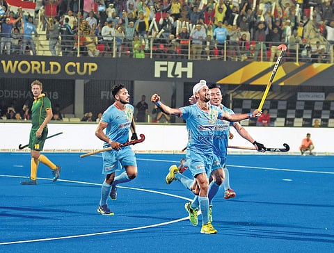 India’s Mandeep Singh (centre) celebrates his goal against South Africa during their Hockey World Cup clash in Bhubaneswar on Wednesday | biswanath Swain