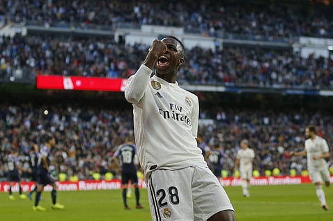 Real Madrid's Vinicius Junior celebrates after scoring his side's first goal against Valladolid | AP