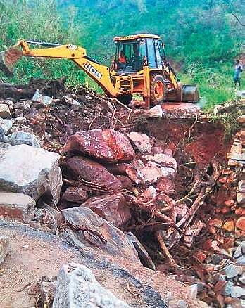 Cleared 9 km road battered by cyclone, restored link