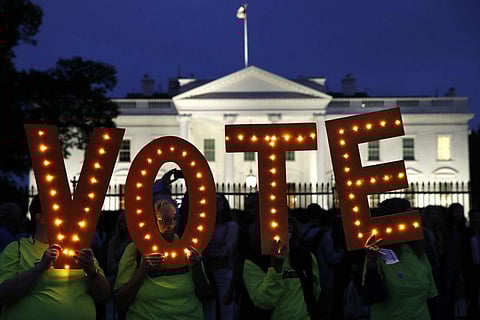 Questions about election integrity erupted in recent days in Georgia, where the governor's race is among the most closely watched elections in the country. (Photo| AP)