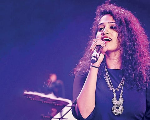 Two worlds, one voice