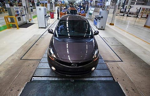 A Tata Tigor car is pictured at the assembly line inside the Tata Motors car plant in Sanand, on the outskirts of Ahmedabad. (Photo | Reuters)