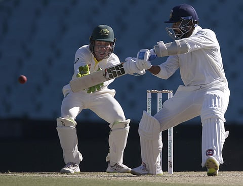 India's M. Vijay, right, bats in an over where he scores 26 runs during their tour cricket match against Cricket Australia XI in Sydney, Saturday, Dec. 1, 2018. | AP