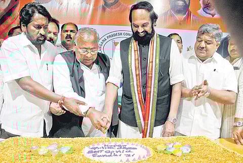 TPCC chief Uttam Kumar Reddy along with other party leaders cuts a cake as part of UPA Chairperson Sonia Gandhi’s 72nd birthday celebrations at Gandhi Bhavan on Sunday