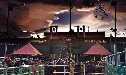 Devotees queueing up to climb the holy steps at the Lord Ayyappa temple in Sabarimala on Sunday | Vincent Pulickal