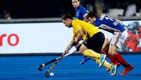 China made a subdued start to the game and allowed France to dominate the possession, relying mostly on their counter-attacking ability to stun their opponents. (Photo | Twitter/Hockey India)