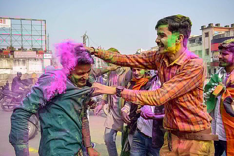 Congress party workers celebrate the party's performance in the Assembly elections of Rajasthan Chhattisgarh and Madhya Pradesh in Allahabad Tuesday Dec 11 2018. | PTI