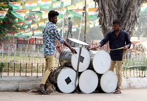 Drummers pack their instruments at Gandhi Bhavan after the election results in Hyderabad. (EXPRESS/S Senbagapandiyan)