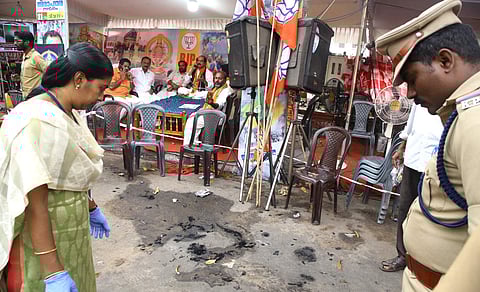 Forensic experts and police inspecting the site where Venugopalan Nair set himself ablaze on Thursday (Photo | EPS)