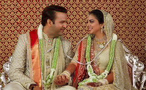 The bride, Isha Ambani, Ivy League-educated daughter of industrialist Mukesh Ambani and the groom, Anand Piramal, son of industrialist Ajay Piramal got married Wednesday in the grandest ceremonies the world has ever witnessed costing about USD 100 million