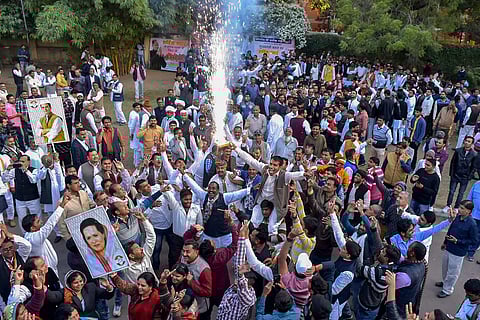 Pilot, Gehlot supporters celebrating after the two were designated for CM and Deputy CM posts.
