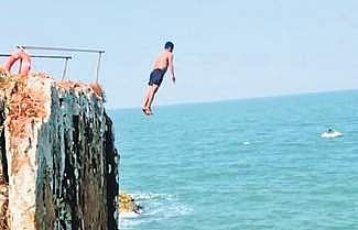 A cliff diver in action at St Mary’s Island