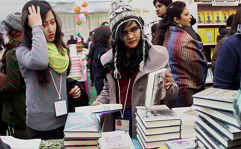 Visitors browsing through books at the Jaipur Literature Festival. (Photo | File)
