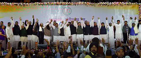 Congress President Rahul Gandhi with newly sworn-in Chhattisgarh Chief Minister Bhupesh Baghel and other party and opposition leaders during the oath-taking ceremony of Baghel's cabinet in Raipur on 17 December 2018. (Photo | PTI)