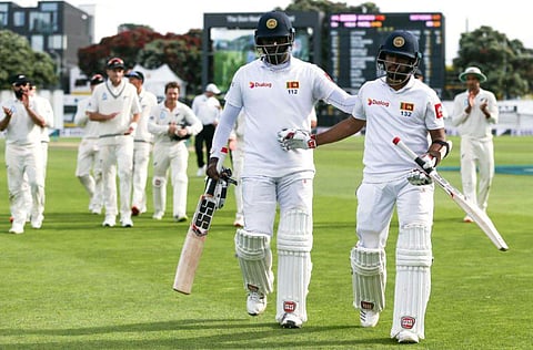 Mendis (R) was unbeaten on 141 and Mathews 120 not out at stumps after a 274-run stand that, along with the weather, allowed Sri Lanka to salvage a draw. (Photo | Twitter/ICC)