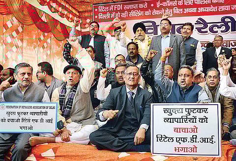 Members of Confederation of All India Traders during a Mammoth Rally against E Commerce, FDI in Retail, in New Delhi on Wednesday.| Naveen Kumar