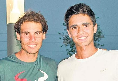 Adil Kalyanpur (right)