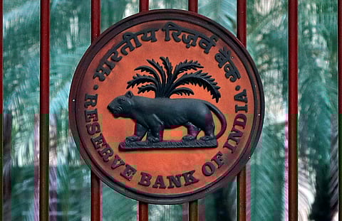 A Reserve Bank of India (RBI) logo is seen at the gate of its office in New Delhi, India.