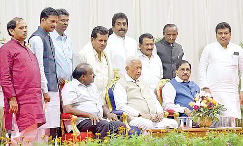 The eight new ministers with CM HD Kumaraswamy, Governor Vajubhai Vala and Deputy CM G Parameshwara | Vinod Kumar T