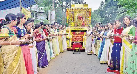 The sacred ornaments being brought in a procession ahead of the opening of the shrine for the 12-day Nadathurappu festival of Thiruvairanikulam temple