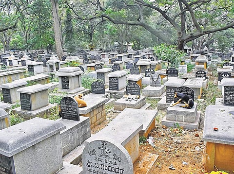 Workers at the Chamarajapet graveyard have been struggling of late to find space for the dead | pandarinath b