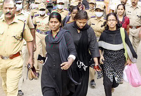 Members of the Manithi team were asked to return midway after protesters disrupted their trek to the holy shrine on Sunday.  (Photo | EPS)