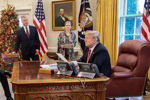 US President Donald Trump working in his office on Christmas Eve (Photo | Donald Trump/ Twitter)