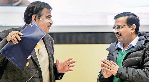 Union water resources minister Nitin Gadkari speaks with Delhi Chief Minister Arvind Kejriwal during an event in Delhi | PTI