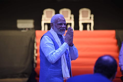 India's Prime Minister Narendra Modi joins hand as he arrives to a Yoga for Peace event at La Rural Convention Center in Buenos Aires, Argentina, Thursday, Nov. 29, 2018 (Photo | AP)