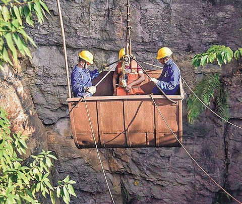 Navy personnel entering the vertical shaft of the illegal coalmine at Ksan in Jaintia Hills district of Meghalaya for a recce | PTI