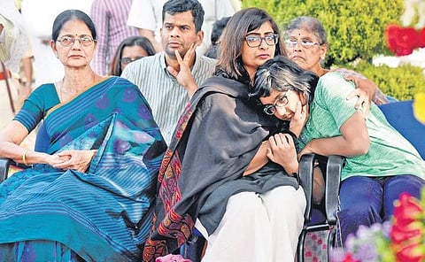 The grieving family members of IPS officer Madhukar Shetty at the Armed Police Training School, Yelahanka, where the officer’s body was kept for the public  to pay homage on Saturday |  Nagaraja Gadekal