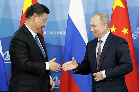 Russia's President Vladimir Putin (R) shakes hands with his China's counterpart Xi Jinping during a signing ceremony following the Russian-Chinese talks on the sidelines of the Eastern Economic Forum in Vladivostok on September 11, 2018. (Photo | AFP)