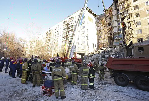 Emergency Situations employees working at the scene of a collapsed apartment building in Magnitogorsk, a city of 400,000 people, about 1,400 kilometers (870 miles) southeast of Moscow, Russia, Monday, Dec. 31, 2018. (Photo | AP)