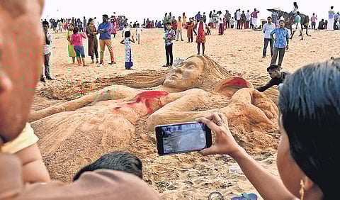 A sand art built in connection with the promotion of Women’s Wall scheduled to be held on Tuesday. The sand art was arranged by the DYFI at Shanghumugham Beach in Thiruvananthapuram on Sunday | B P Deepu