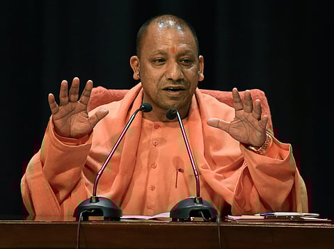 Uttar Pradesh Chief Minister Yogi Adityanth addresses a press conference in relation to Congress' involvement in AgustaWestland chopper deal at Lok Bhawan in Lucknow on MOnday. (Photo | PTI)