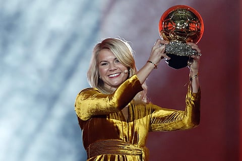 Olympique Lyonnais' Ada Hegerberg celebrates with the Women's Ballon d'Or award during the Golden Ball award ceremony at the Grand Palais in Paris on 3 December 2018. (Photo | AP)