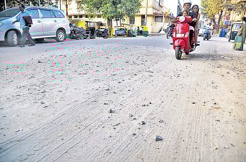 Cottonpet Road, an arterial link between West and South Bengaluru, often sees parts of the stretch caving in (Photo | Nagaraja Gadekal)
